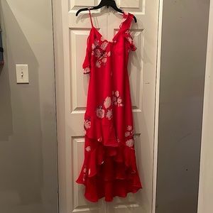 Stand out with this beautiful red flowery dress!